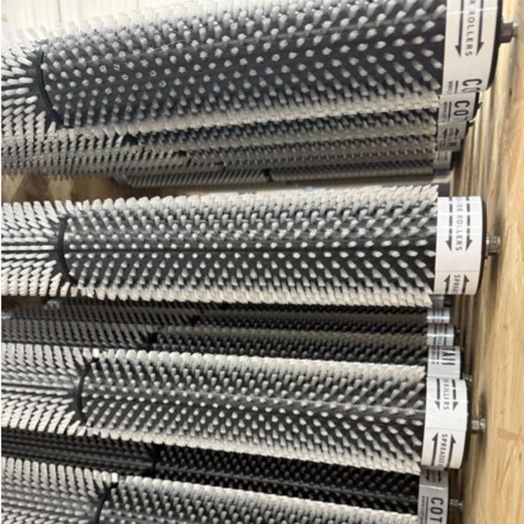 Spreader rollers